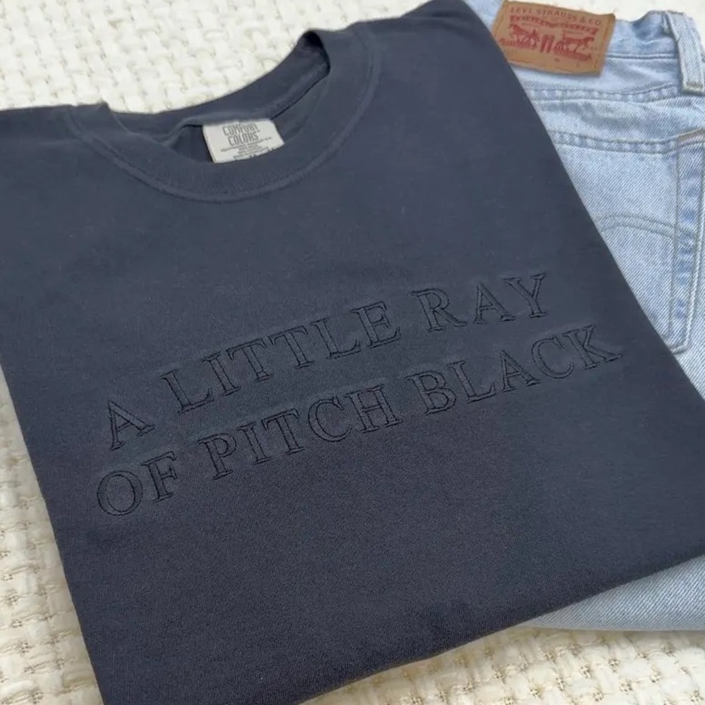 Black Comfort Colors “A Little Ray of Pitch Black” Graphic Tee